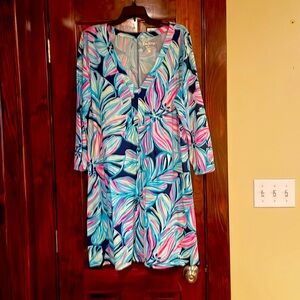 Lilly Pulitzer VNeck long sleeves swing dress. Barely worn excellent shape